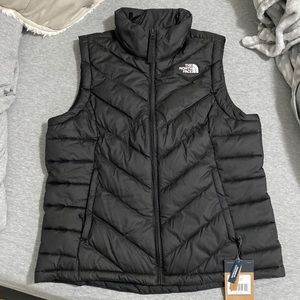 Brand new north face vest with tags! Size large